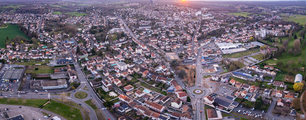 n aerial panoramic view around the old town of the city ellerive-sur-Allier in France on a sunny afternoon in early spring