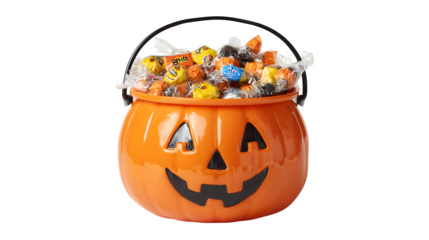 Trick-or-treat jack-o-lantern candy bucket filled with sweets, isolated on white background