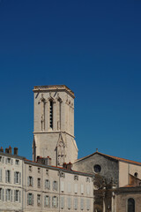Obraz premium Tower of the Saint-Sauveur Church in La Rochelle, France. Featuring its historic tower and classic architecture, located in the heart of this charming coastal city in southwestern Europe.