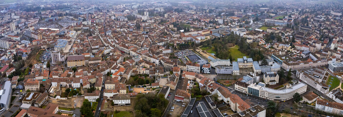 An aerial panoramic view around the old town of the city Bourg-en-Bresse in France on a sunny day in early spring