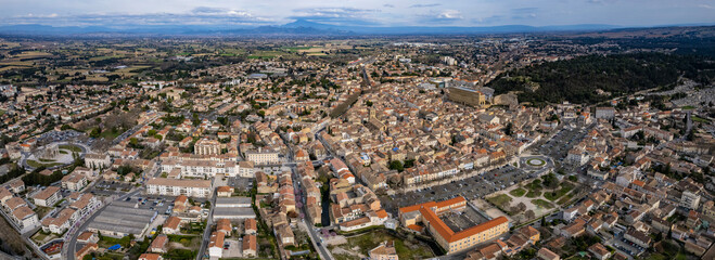 An aerial panoramic view around the old town of the city orange in France on a sunny day in early spring
