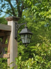 Outdoor Lantern on Wooden Post in Garden Setting
