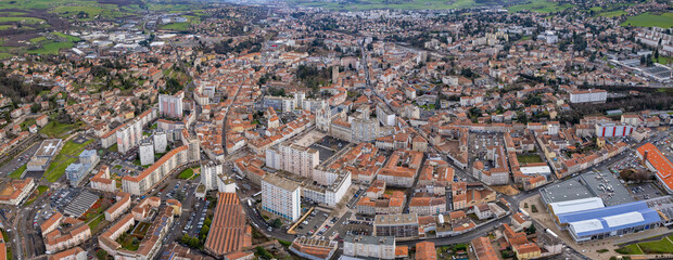 An aerial panoramic view around the old town of the city Riom in France on a sunny day in early...