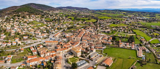 An aerial panoramic view around the old town of the city Riom in France on a sunny day in early...