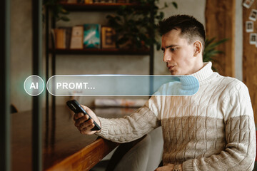 Man in a cozy sweater engages with a smartphone in a modern cafe during daytime, showcasing a relaxed atmosphere and technology use