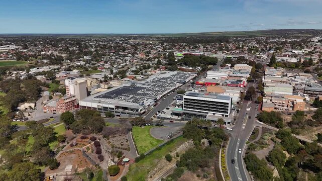 Murray Bridge City, South Australia: 4K Aerial Drone Footage of City Center, CBD with Low Density Houses with Solar Panels, Estates, Shops, Streets, Roundabout, Parks, Scenic Murray River Landscape