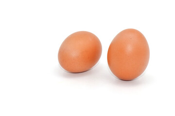 Eggs on a white background are a good source of protein. which helps build and repair worn out parts of the body.