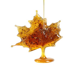 Naklejka premium Maple syrup drizzling over a delicate amber leaf shape in a bright setting during autumn