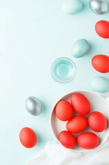 Colorful easter eggs in a bowl with pastel background and decorative accents for spring celebrations and festive decorations
