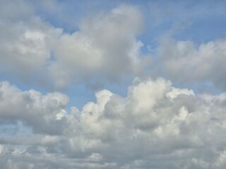 Fluffy White Clouds in a Blue Sky