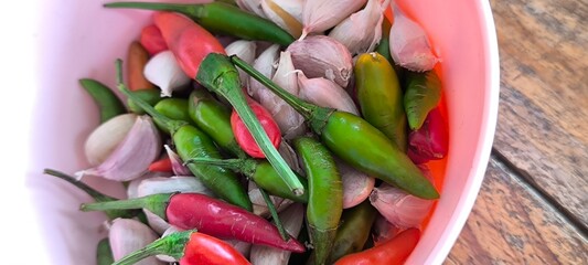 Garlic and chili in a pink cup