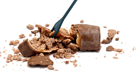 chopped chocolate bonbon and disposable fork