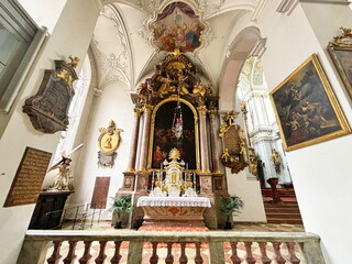 The altar of St. Peter's Church surrounded by masterpieces of world icon painting. gilded...
