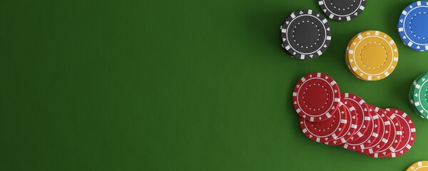 Stacks of green, black, and blue poker chips or tokens with red chip stack fallen over on green playing table felt flat lay top view background with copy space