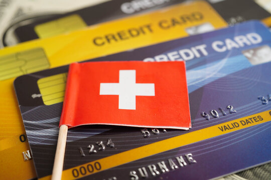 Switzerland flag on credit card, finance economy trading shopping online business.