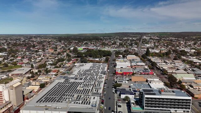 Center of Murray Bridge City, South Australia: 4K Aerial Drone Footage of CBD with Shops, Busy Streets, Roundabout, Low Density Houses with Solar Panels, Estates, Parks, Scenic Murray River Landscape