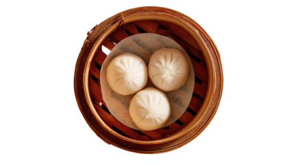 Three steamed dumplings in a bamboo steamer (2)