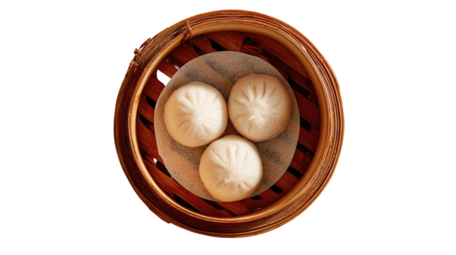 Three steamed dumplings in a bamboo steamer (2)