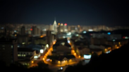 Obraz premium A glowing night cityscape with atmospheric perspective and soft lights, creating a dreamy urban ambiance.