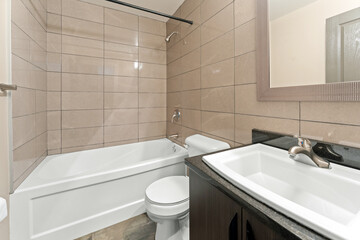 Bathroom with a white toilet and sink