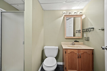Bathroom with a white toilet and sink