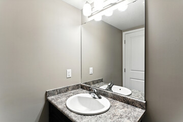 Bathroom with a sink and mirror