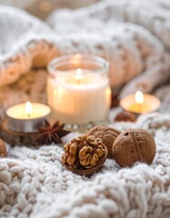 Cozy autumnal candles and nuts