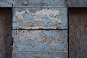 old painted wall, peeling paint on a wall