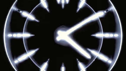 Closeup of Clock Showing Time with Illuminated Hour Markers at Night