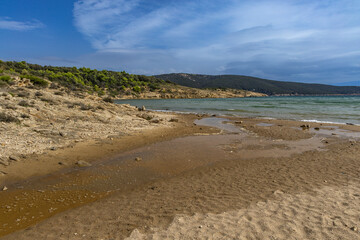 Podsilo beach on the island of Rab, sandy beach, waves from the Moriatyckie flood the beach,