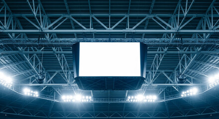Stadium scoreboard with blank white screen and bright arena lights