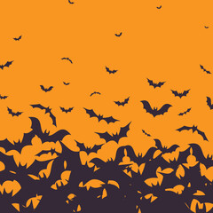 Silhouette of flying bats scattered across orange background in dark color