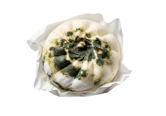 Close-up of a steamed bun with visible mold growth, presented on white paper.