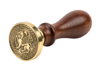 A detailed view of a brass and wood seal, featuring a griffin design, highlighting the intricate knotwork and polished surfaces.