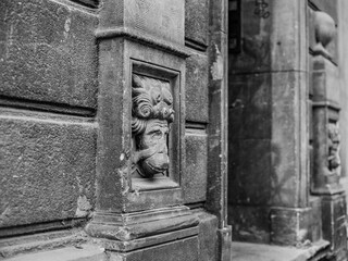 Stone detail of an old house in Poznan, Poland. Analog photography. Vintage style. 