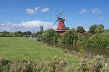 the famous Windmills of Greetsiel at North Sea,East Frisia,lower Saxony,Germany