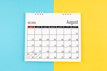 August 2026 calendar on blue and yellow color background, Flat lay.