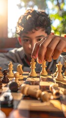 Focused boy playing chess