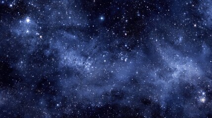 Naklejka premium A vast expanse of the night sky showcases countless stars and nebulae, creating a mesmerizing cosmic landscape. The deep blue hues and sparkling celestial bodies invite wonder and exploration.
