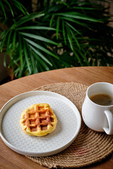 Pumpkin waffles for breakfast with coffee