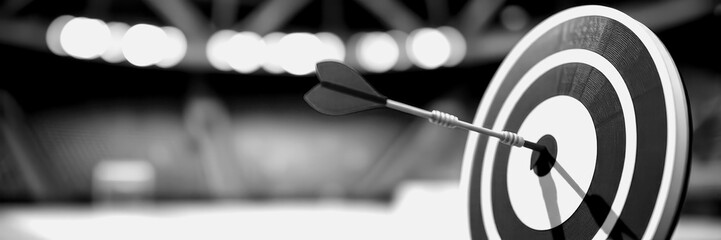 Arrow hitting target in indoor archery range