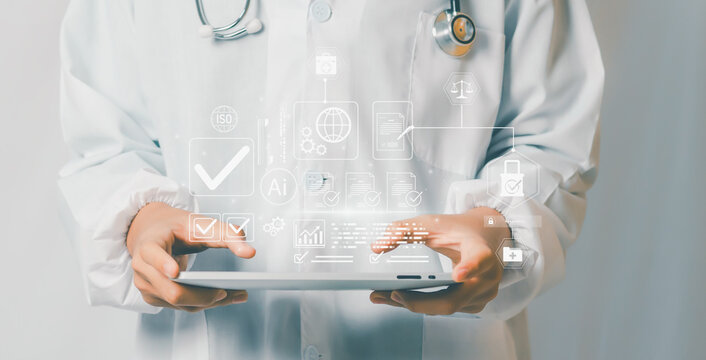 Concept of Digital Compliance & Quality showing doctor using tablet with glowing checklist icons, ISO symbols, secure approval workflow, representing healthcare standards, audit assurance, efficiency.