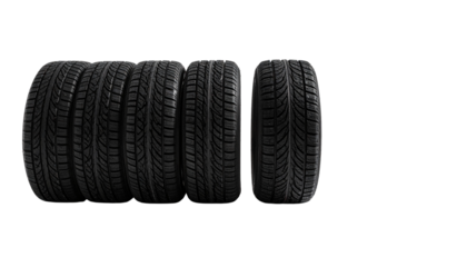 An array of five black tires aligned neatly, ready for action