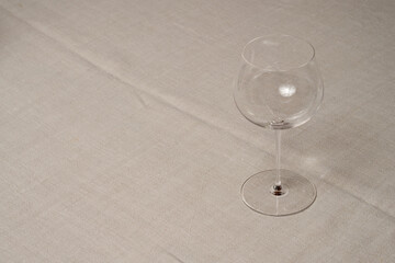 Empty Burgundy Red Wine Glass on a Table