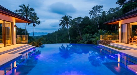 Luxury Villa Retreat at Dusk with Infinity Pool and Tropical Landscape