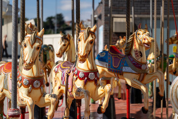 Colorful carousel with vintage horses © MarshallChan