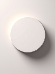 A simple white round object casting a subtle shadow on a textured background