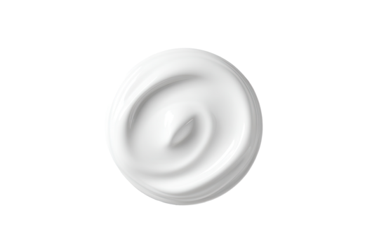 Creamy white substance swirled in a circular pattern against a black background.  A smooth, glossy texture is evident