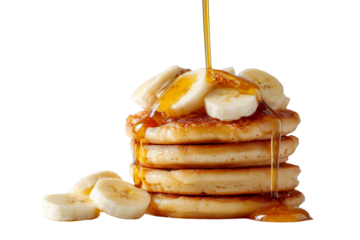 Delicious stack of golden pancakes topped with fresh banana slices and drizzled with syrup