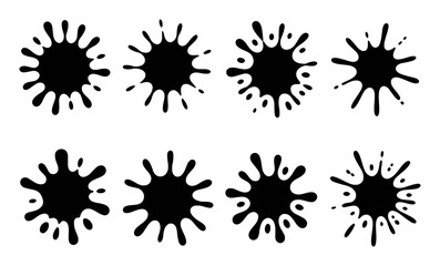 Collection of Black Ink Splatter Shapes on White Background